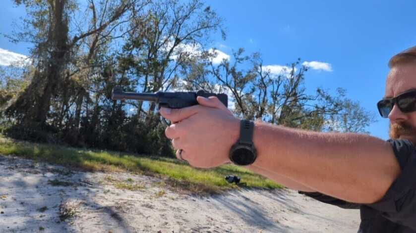 Man shooting stoeger luger