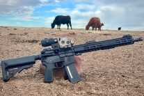 Smith & Wesson Volunteer XV Pro sitting out in the pasture leaning against a salt block set out for our cattle