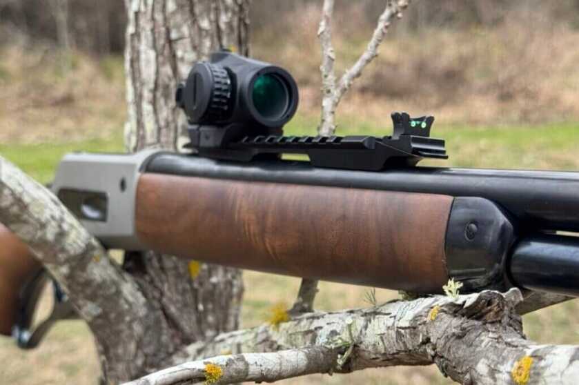 Silicon grip on polished wood rifle stock