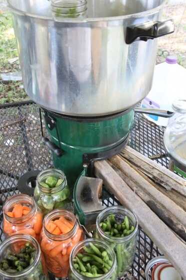 Prepping 101: Rocket Stove Canning My first shot at canning with my StoveTec Rocket Stove didn't work. As you can see, I didn't attempt to use the heat ring because it didn't fit around the pot, and I stuffed the fuel door with palm fronds, which for normal cooking works great, because you don't want ripfire heat.