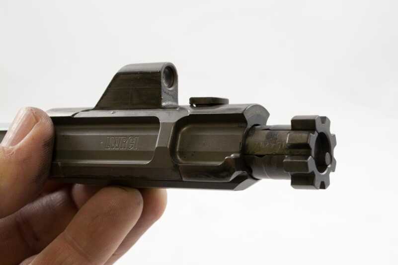 This bolt hasn't been cleaned yet and has hundreds of rounds of .308 through it. Note how clean a piston system keeps the bolt and carrier.