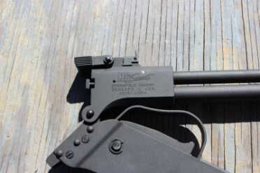 The guard prevents the M6 from folding cleanly, so it has a pin for take-down.
