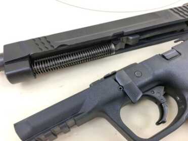 Gun Review: Smith & Wesson M&P 45 Threaded Field stripping is easy - just rotate the takedown lever to remove the slide assembly.