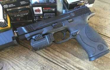 Gun Review: Smith & Wesson M&P 45 Threaded So i could get an unobstructed sight picture, I mounted this Crimson Trace Rail Master Pro for accuracy testing.