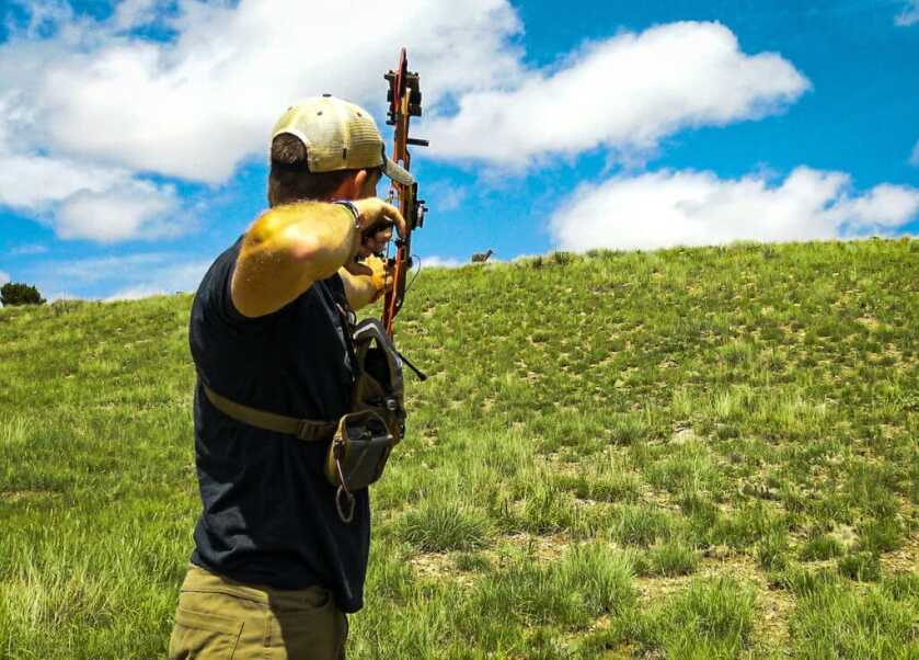 Three Archery Games That Will Make You A Better Bowhunter Bowhunter practicing archery in the great outdoors