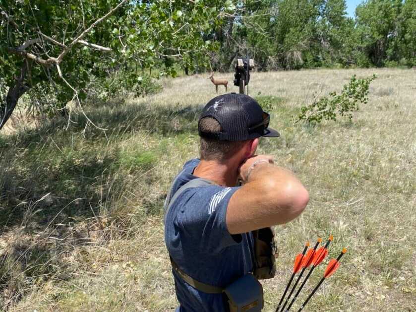 Three Archery Games That Will Make You A Better Bowhunter Bowhunter aiming at deer targer