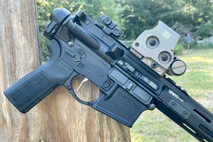 Springfield SAINT Victor with LAW Tactical Folder Reviewed! Just a picture of the SAINT Victor with the Law Tactical ARIC-M installed. The -M is for suppressed usage, and the -C variant is for unsuppressed usage. The -M carrier did not cycle in this rifle without a suppressor