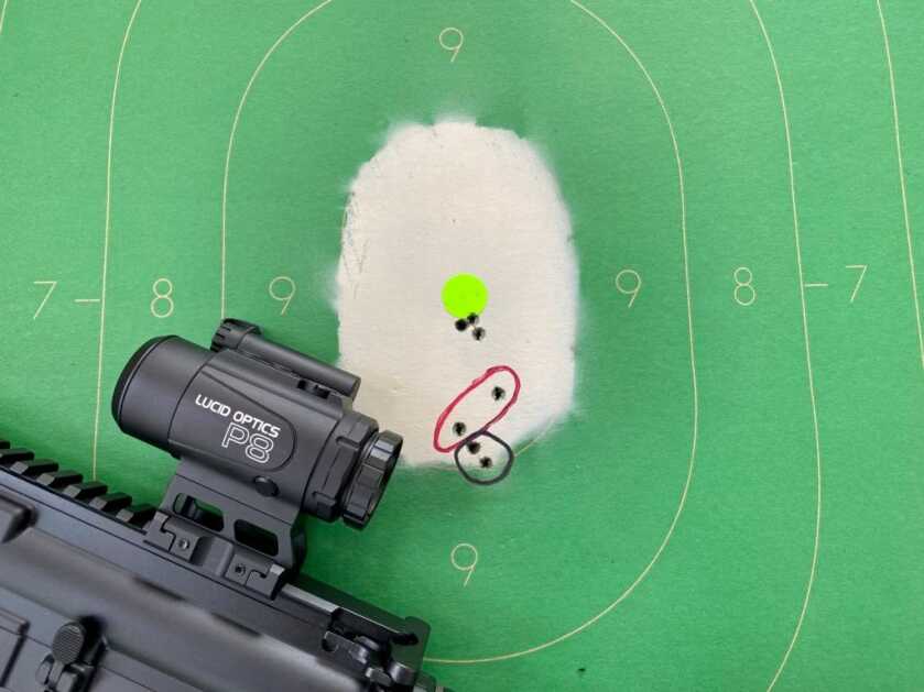 3 - Big Features, Small Scope: The P8 4x Prismatic Optic 7 bullet holes in a cardboard target