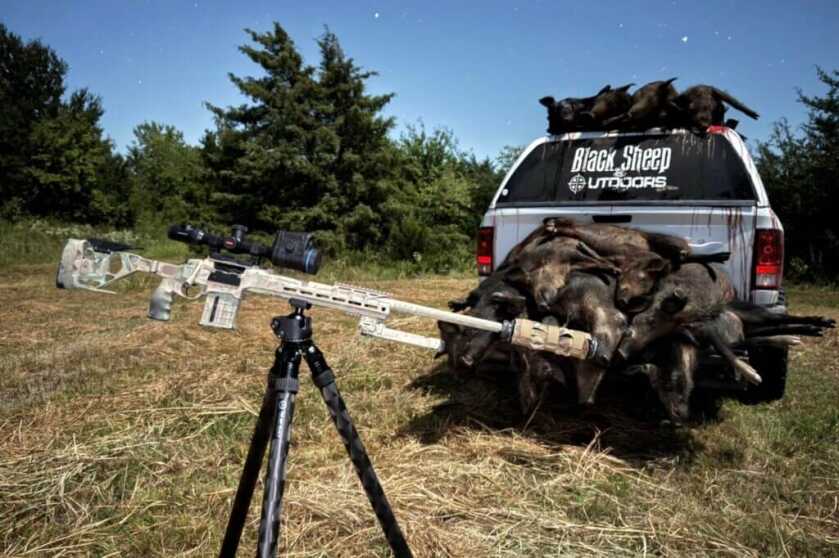 QDT V2 LS Inverted tripod in front of white truck in field