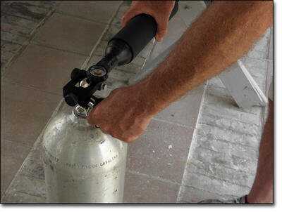 A scuba tank makes filling the air reservoir quick and easy