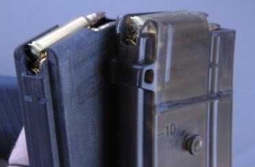 The regular 556 is available with standard AR mags but this A1 just comes with the original polymer Swiss mags.