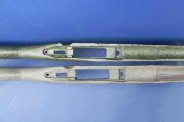 A take-off drill rifle stock (bottom) is modified for use on the Pig Buster. It’s a tough synthetic that will stand up to years of abuse.