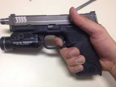 Apex Tactical's S&W M&P Trigger Replacement Author depresses trigger all the way to the rear. Almost a half inch less travel than the stock trigger assembly.