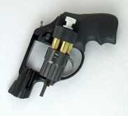 With the HKS speedloader, you just need to start the rounds into the cylinder. Then with a twist of the silver knob, the rounds drop free.