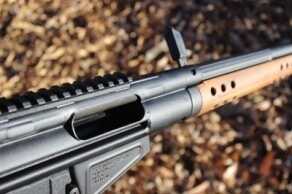 The charging handle holds the bolt open and allows for decent access to the chamber.