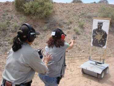 Most gun fights occur at a distance of five feet or less.