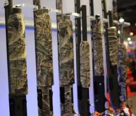 The New Mossberg Duck Commander Line: Duck Guns Worthy of Duck Dynasty The shotguns without Max-5 on the receivers and barrels are the special edition guns. They are engraved with the two Robinson family mantras, “Faith, Family, Ducks” and “Happy, Happy, Happy”.