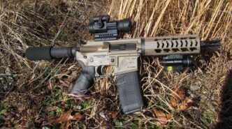 Equipped with a red dot sight and combination tactical light/laser, the DB15P could be a formidable short-range personal defense weapon.)