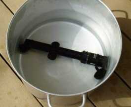 The scope was completely submerged in water for five minutes with the lens caps off.