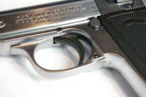 Pull down on the guard for disassembly