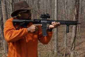 As it is with many AR-15s, a good optic will improve split times and target acquisition.  Many prefer to use risers with optics so they can keep their heads up.