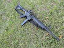 LAR-9 rifle sitting on ground