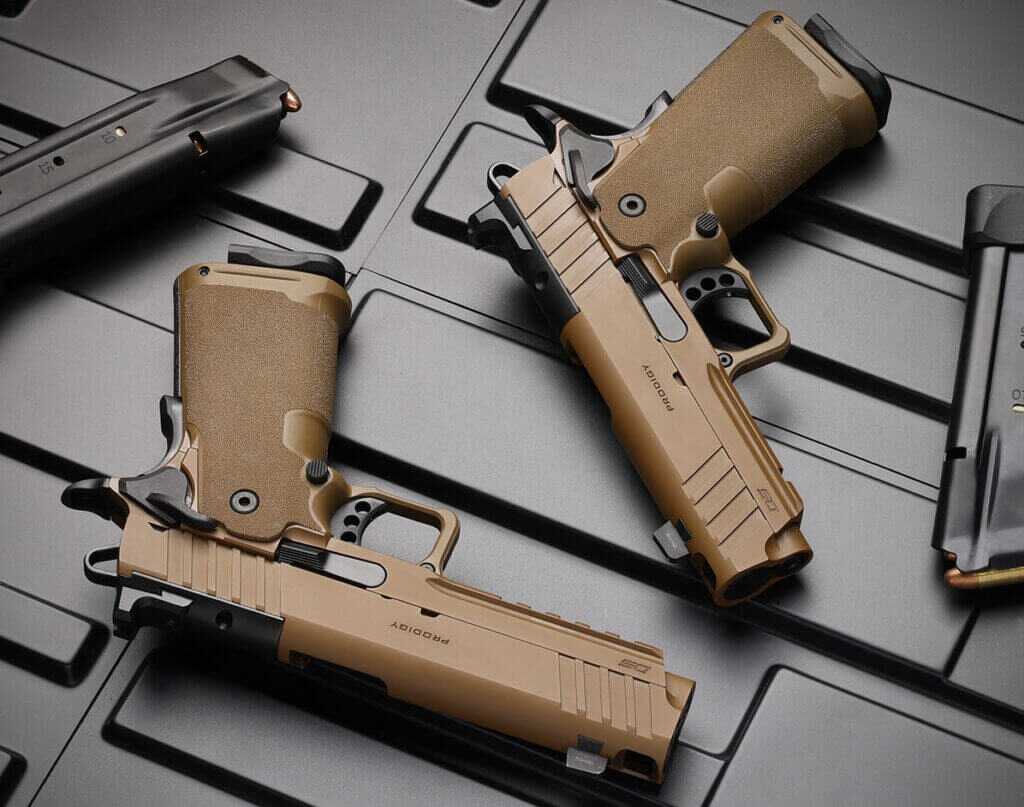 Two 1911 prodigy pistols in coyote brown.