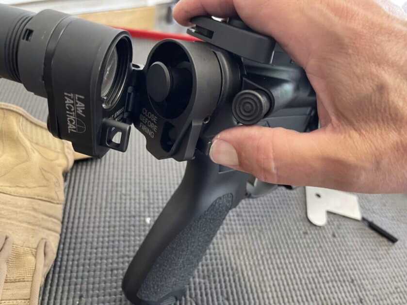 Law Tactical Folding Stock Adapter button