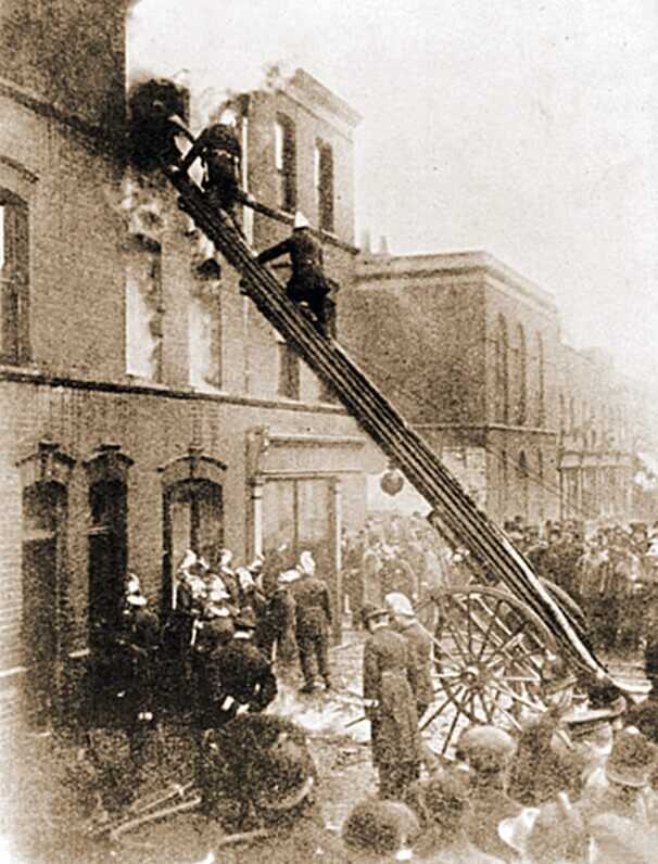 men on ladders. london