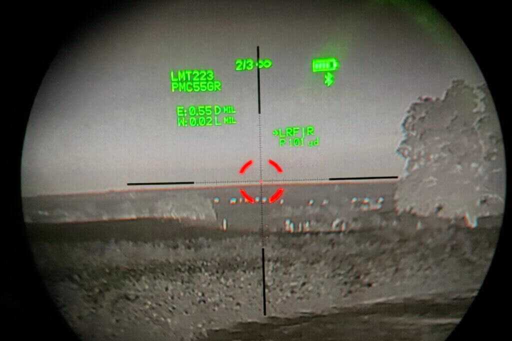 Through-the-scope view of Maztech X4-FCS HUD overlay with thermal clip-on attached