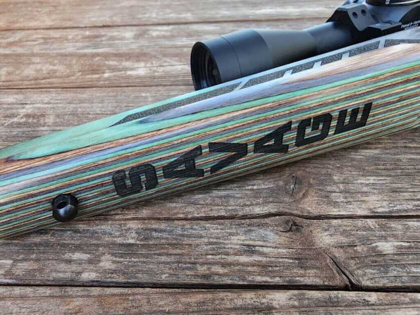 Savage Mark II Minimalist in 21 Sharp with threaded barrel and Boyd’s green laminate forend