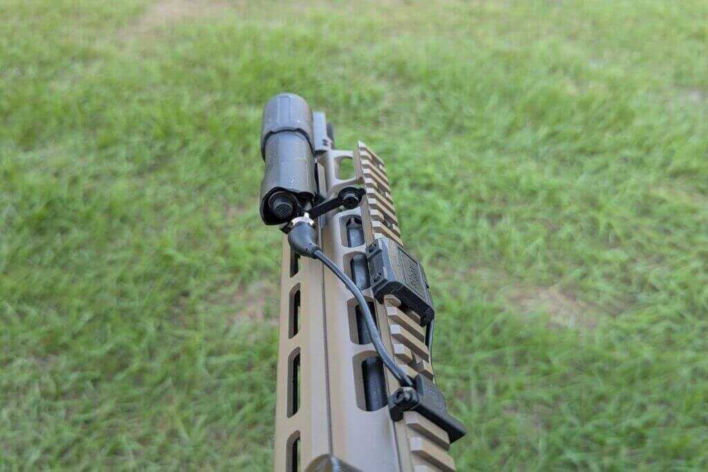 M-LOK handguard with rifle light mounted forward to minimize barrel shadow