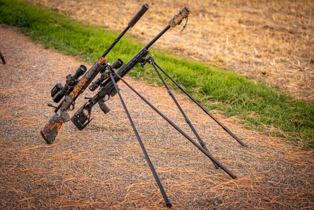 Two rifles shown with extra tall CKYE-POD setups extended on R3D legs for maximum height