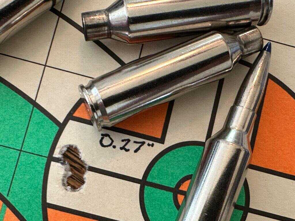 Blaser R8 Ultimate 100-yard target showing tight groups during testing