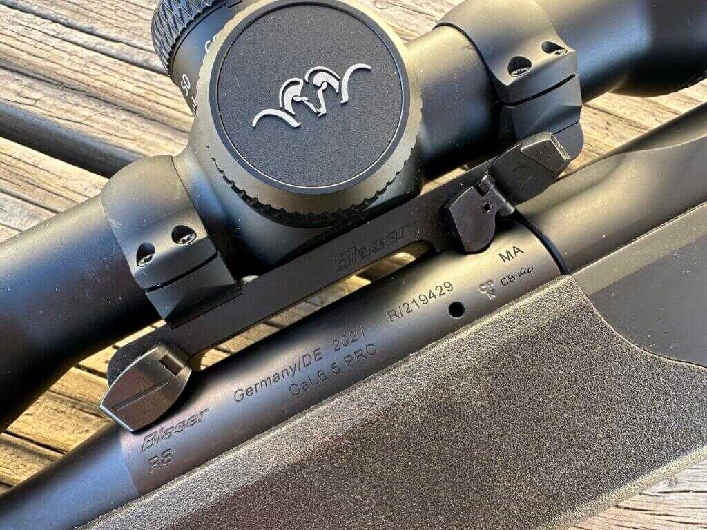 Blaser QD Saddle Mount attached with one lever open to show mechanism