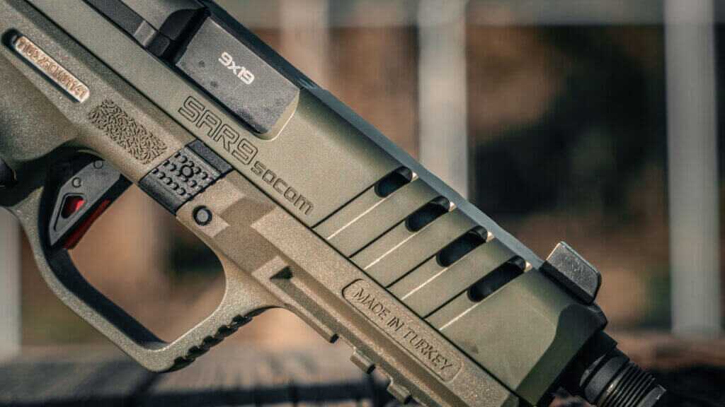 SAR9 SOCOM on the range with optic and threaded barrel