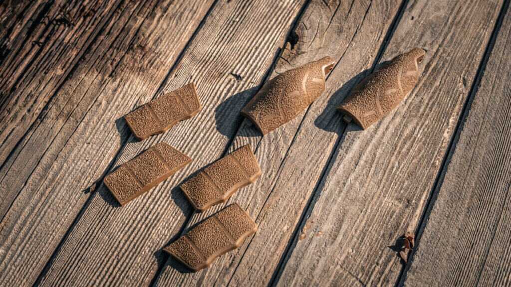 Interchangeable backstraps and grip panels for SAR9 SOCOM customization