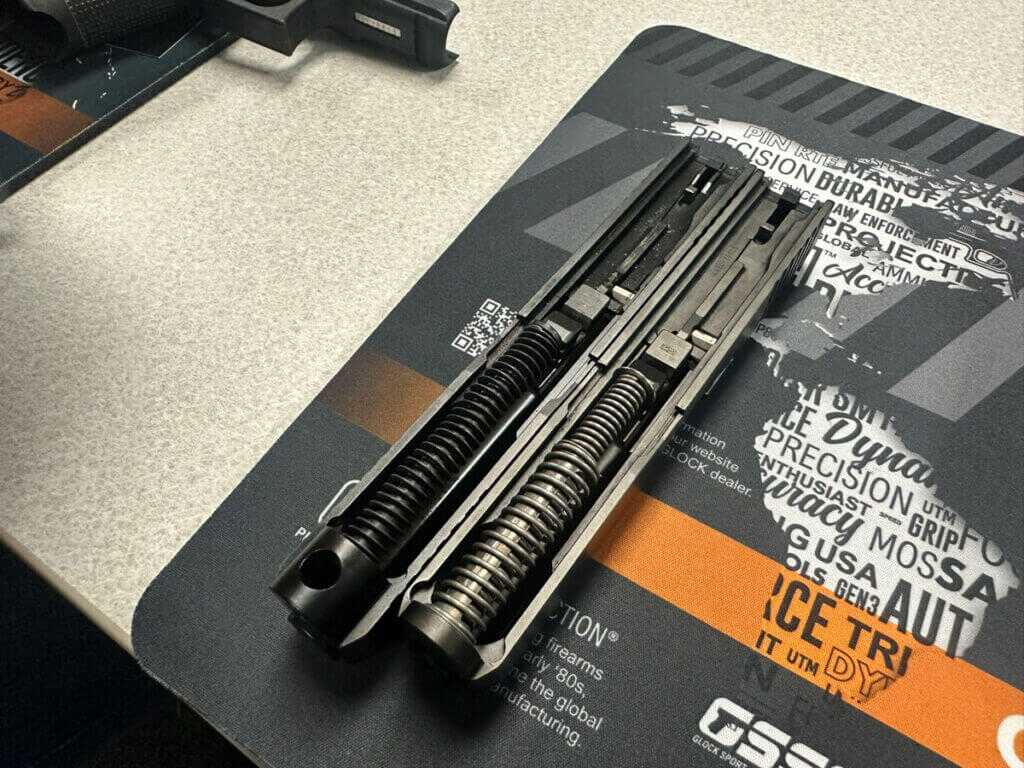 Glock Gen 6 single captured recoil spring compared to Gen 5 dual spring side by side
