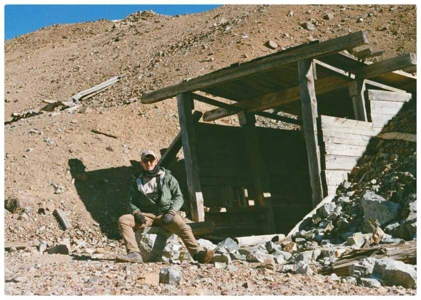 Author at mountain mineshaft entrance shot on 35mm film Pentax ME Super