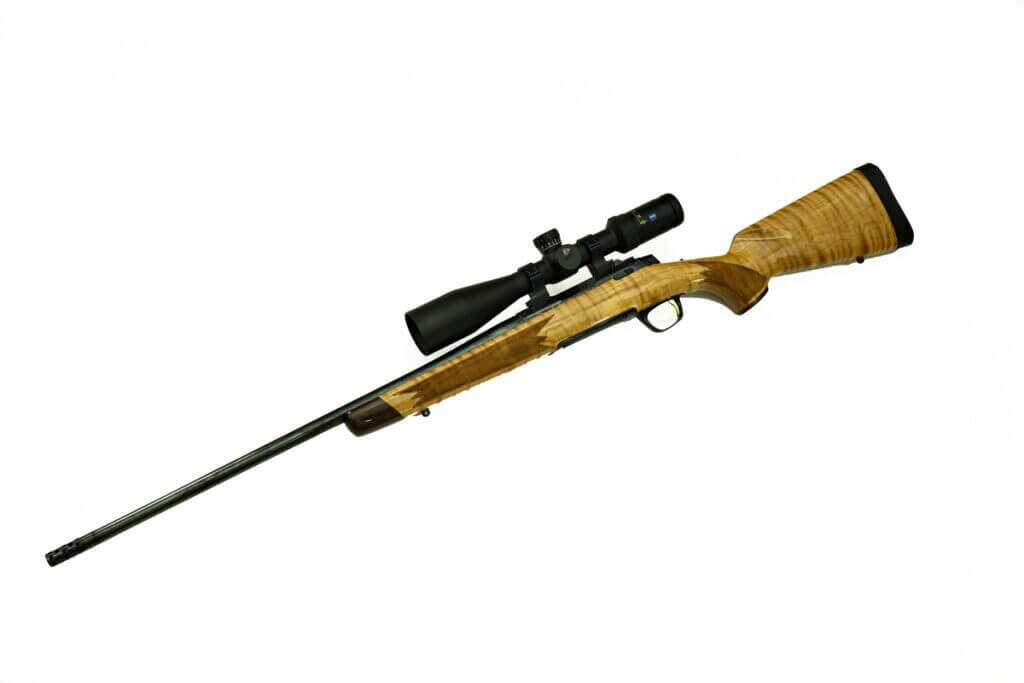 Browning X-Bolt 2 Medallion Maple on bench with Zeiss optic showing sporter contour barrel and maple stock figure