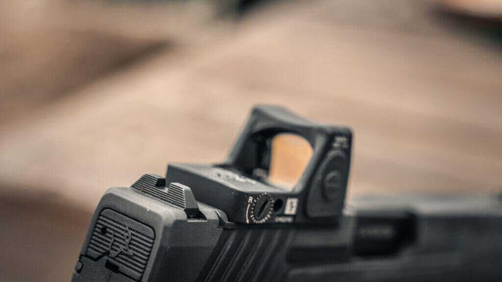 Taurus TX9 optics ready slide with mounted Trijicon RMR