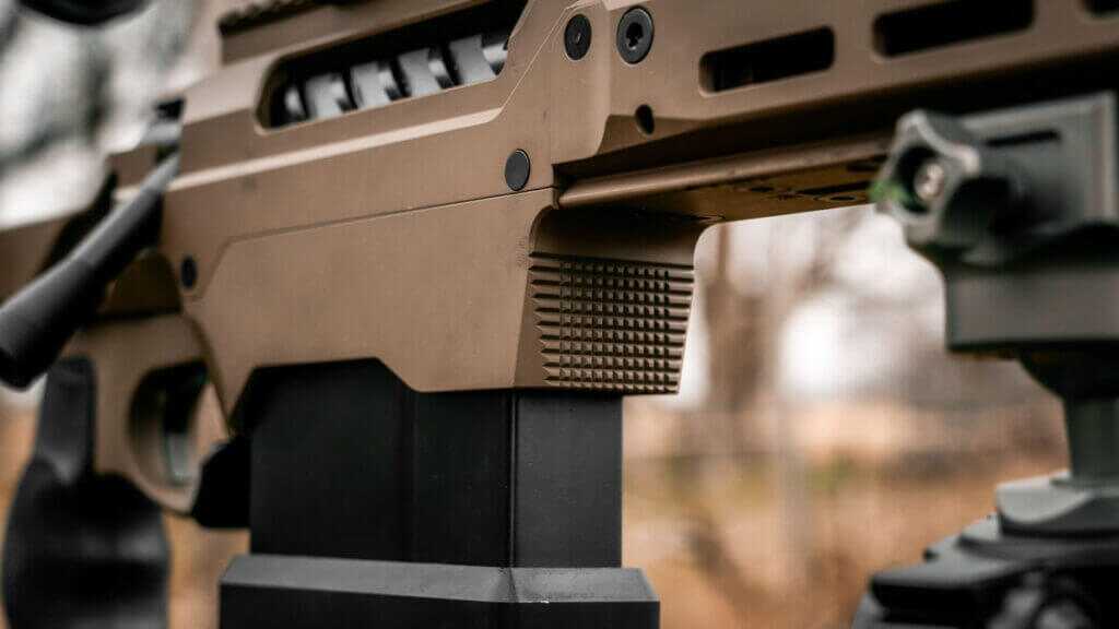 SIC receiver and bolt interface close-up, safety visible