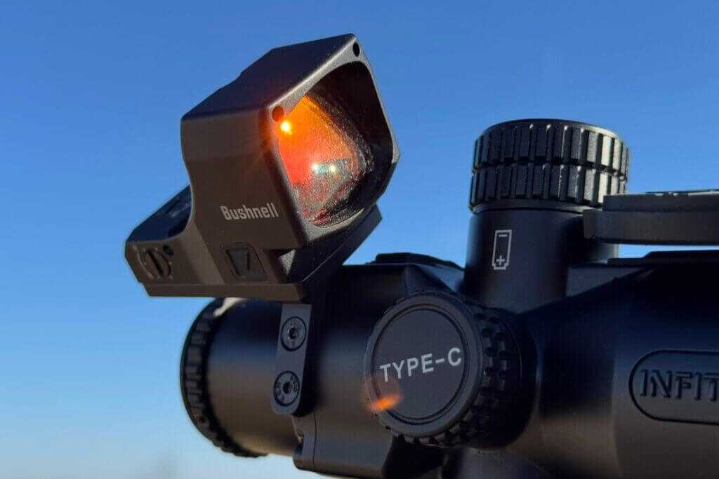 Two screws secure the IOL25 offset red dot mount on the right side of the housing