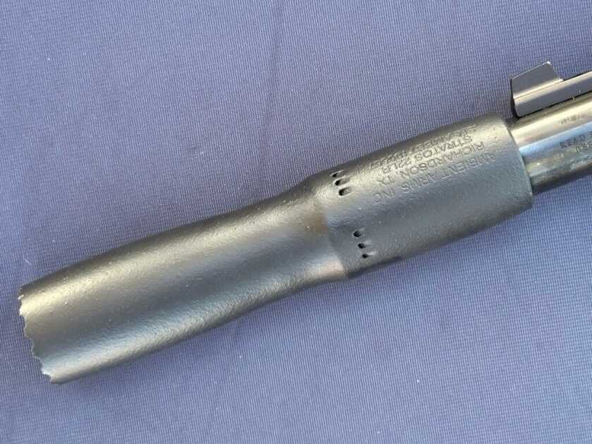 Side profile of the Stratos .22 and view of the intake ports on the back 1/3rd of the suppressor.