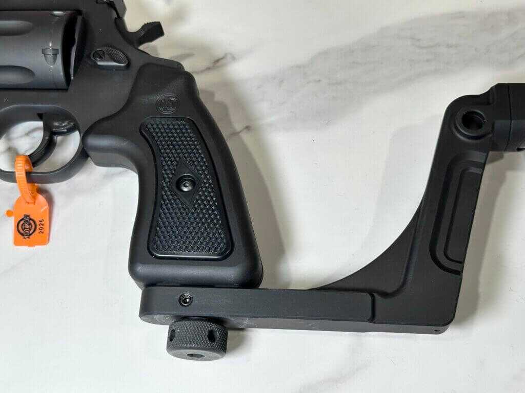A closeup view of the Bounty Hunter Series stock at its attachment point on the grip.