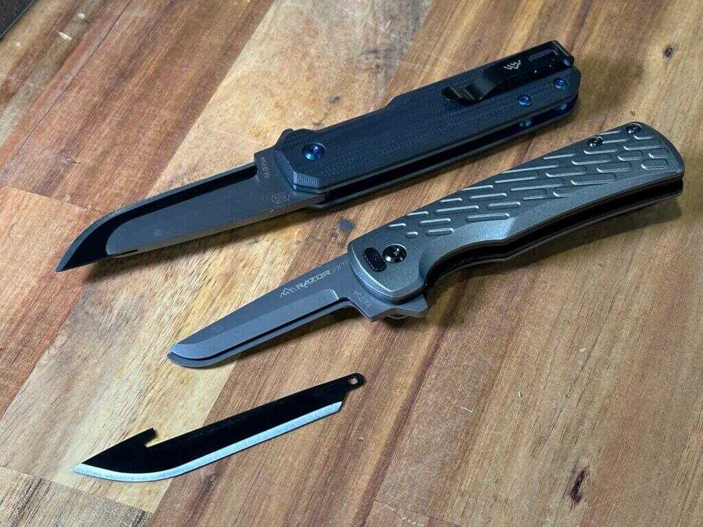Two knives are shown. The top knife has a blade installed, and the lower blade sits next to an uninstalled blade.