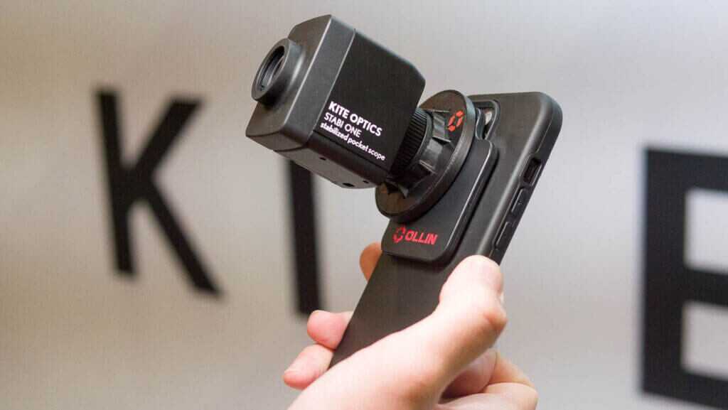 The monocular attached to the phone case.