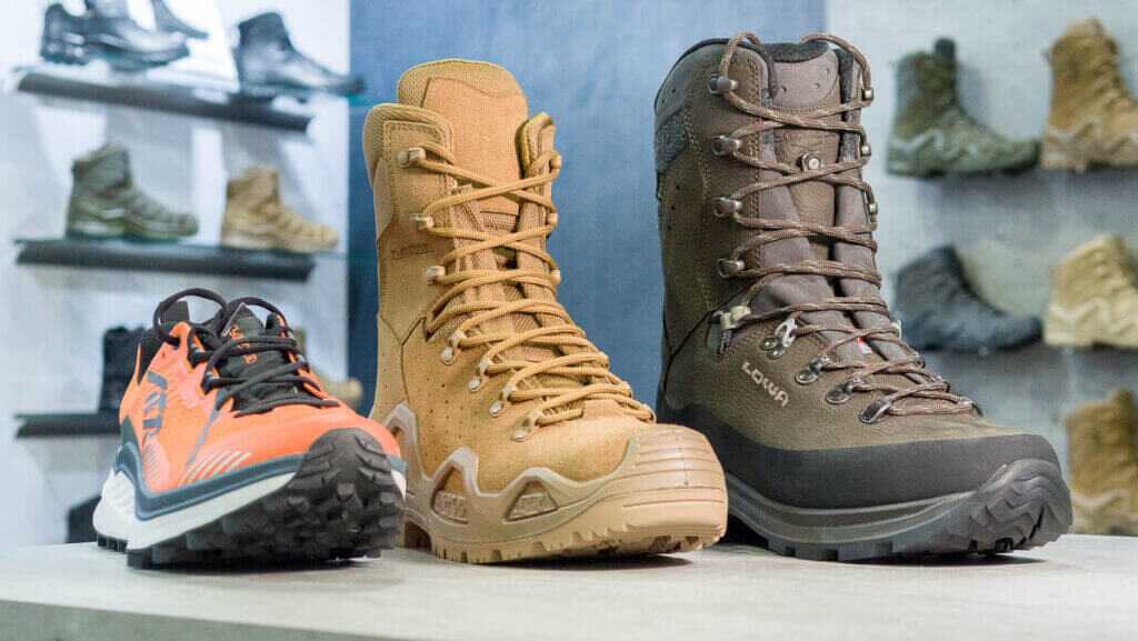 Three shoes sitting on a table facing forward and right.