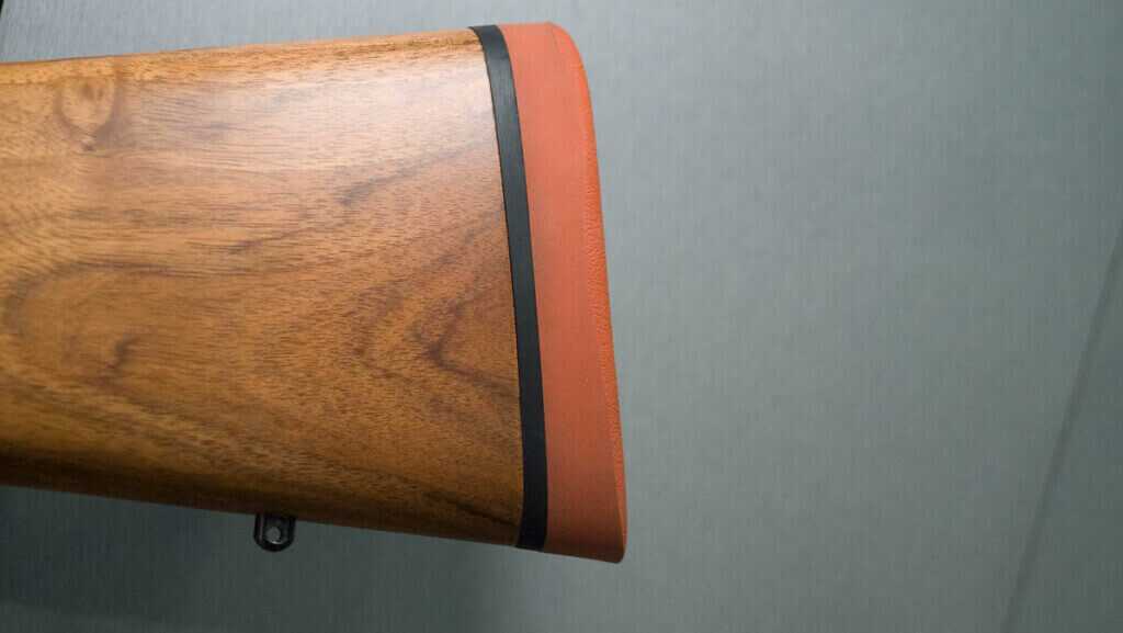 close up view of the butt stock showing the classic red rubber recoil pad.