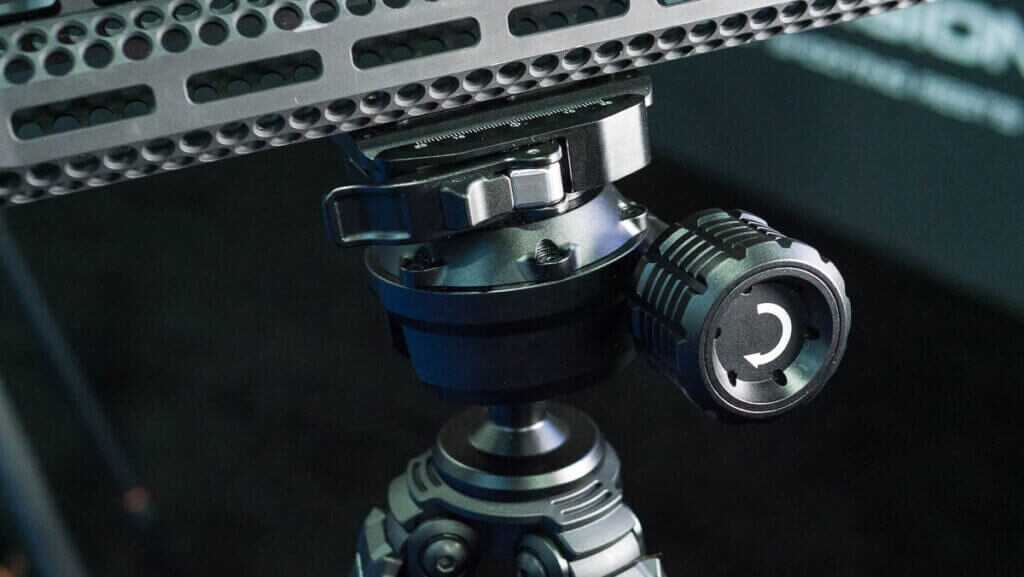 close up of the head with a rifle mounted.